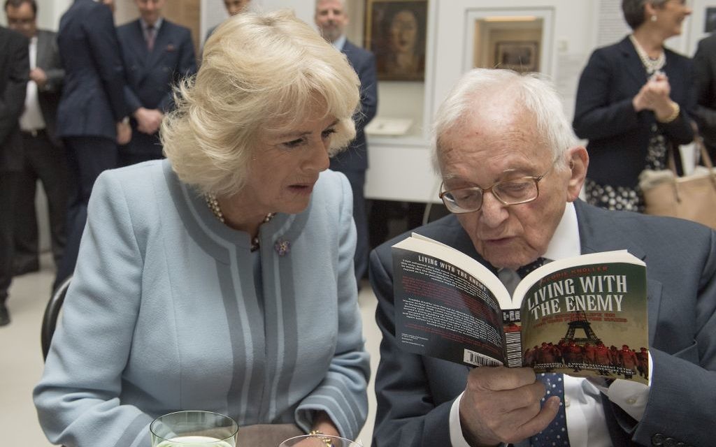 Auschwitz holocaust survivor Freddie Knoller speaks to the Duchess of Cornwall during her visit to The Jewish Museum in Vienna, Austria on the ninth day of the Prince of Wales's European tour. 

Photo credit: Arthur Edwards/The Sun/PA Wire