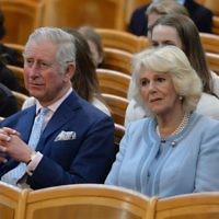 The Prince of Wales and Duchess of Cornwall listen to an orchestra play at the Musikverein concert hall in Austria on the ninth day of their European tour. (Photo credit: John Stillwell/PA Wire)