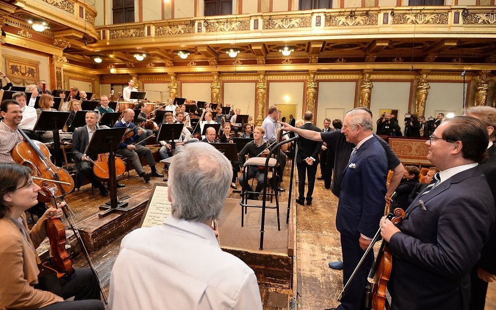 The Prince of Wales looks at an orchestra at the Musikverein concert hall in Austria on the ninth day of his European tour. (Photo credit: John Stillwell/PA Wire)