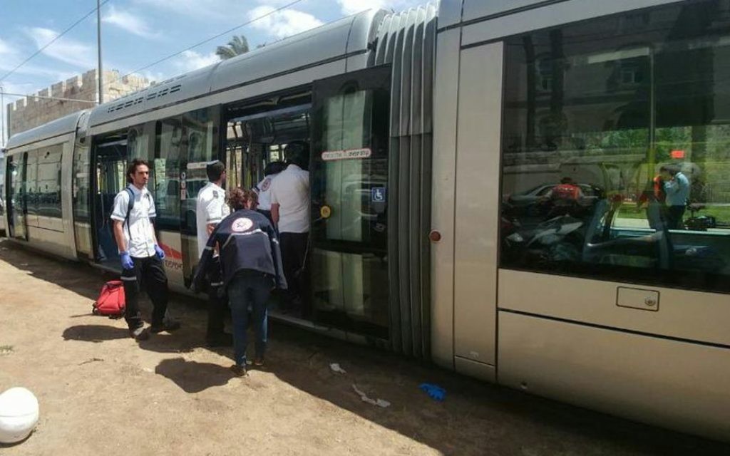 Handout photo taken from the Twitter feed of Magen David Adom/@Mdais of one of their teams evacuating a woman in critical condition with stab wounds from a train in Jerusalem. (Photo credit should read: Magen David Adom/@Mdais/PA Wire)