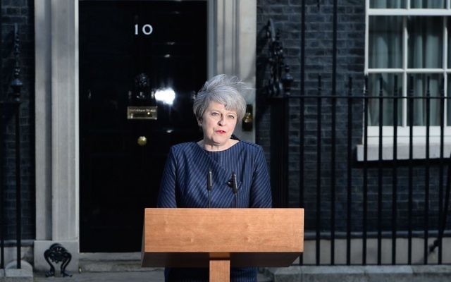 Prime Minister Theresa May makes a statement in Downing Street, London, announcing a snap general election on June 8.

 (Photo credit: John Stillwell/PA Wire)