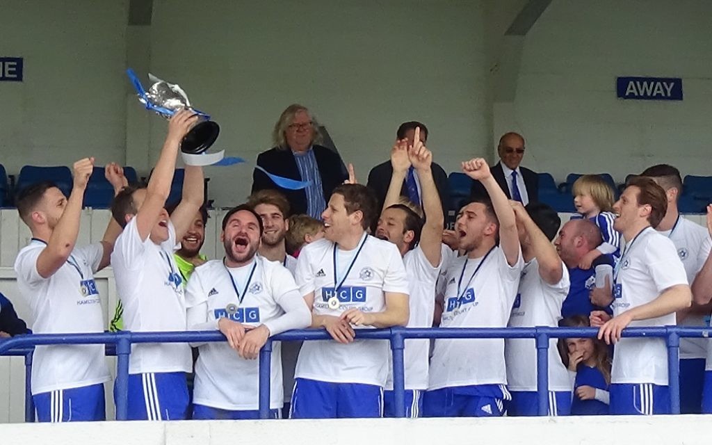 Lions celebrate winning the Cyril Anekstein Cup