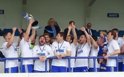 Lions celebrate winning the Cyril Anekstein Cup