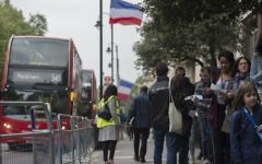 Expatriate voters prepare to cast their ballots for the second round of the French presidential election at a polling station at Lycee Francais Charles de Gaulle in south Kensington, London.