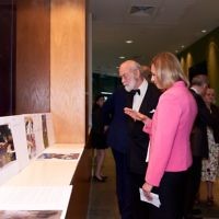 Prince Michael of Kent looking at the art exhibition with Elise Moore-Searson