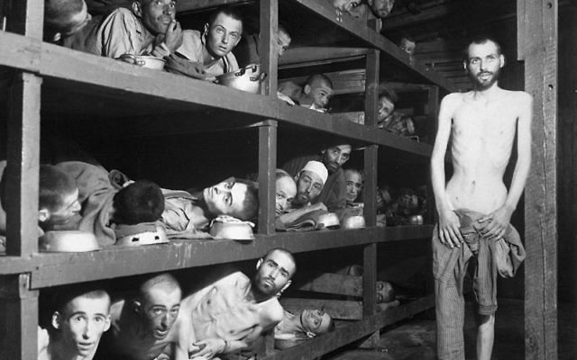 Buchenwald, photo taken April 16, 1945, five days after liberation of the camp. Wiesel is in the second row from the bottom, seventh from the left, next to the bunk post. .