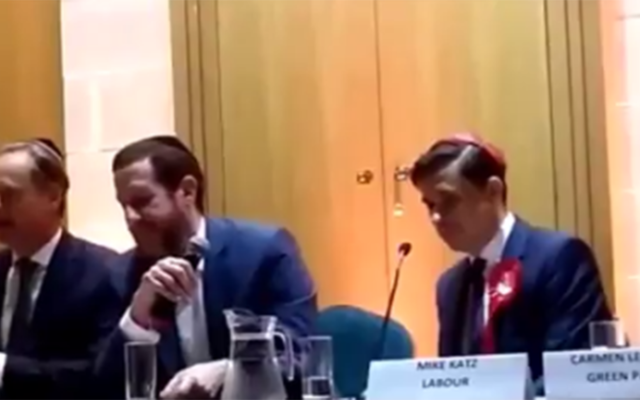 Matthew Offord, left, speaking at Mill Hill shul, with Labour's Mike Katz on the right