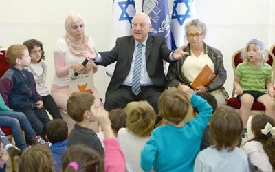 President Rivlin hosts children at a Hand in Hand school for Jewish and Arab students and teachers