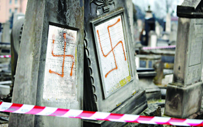 Jewish graves daubed with swastikas