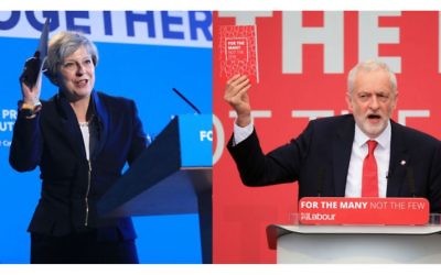 Theresa May and Jeremy Corbyn holding their manifestos