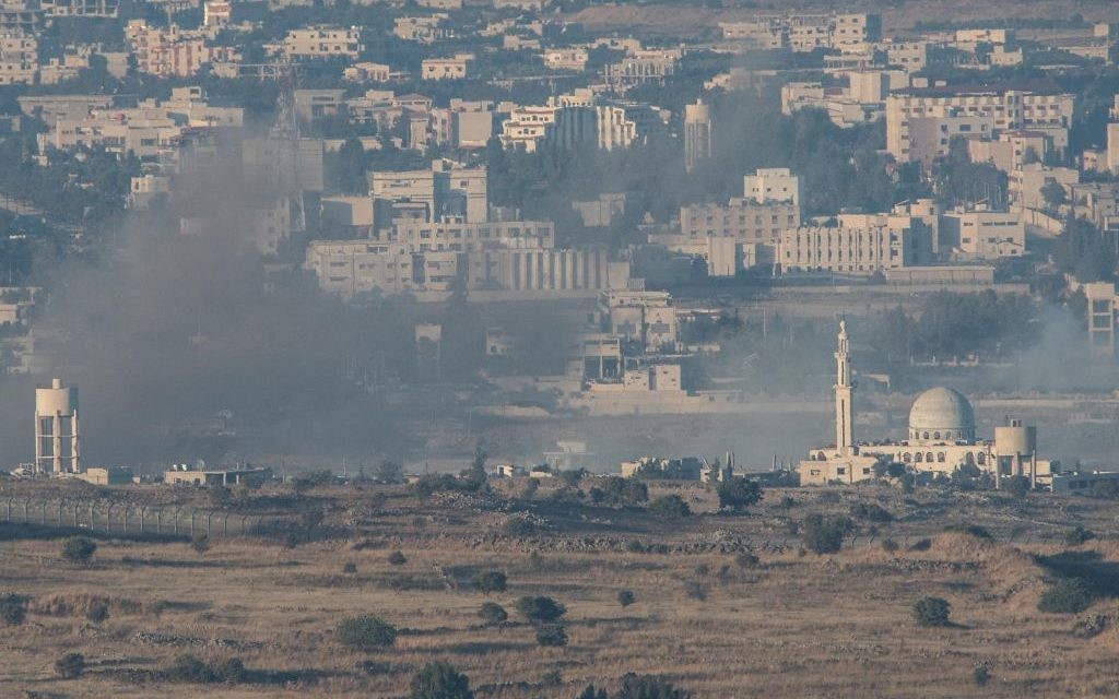 Smoke rise from Syrian village as a result of fighting near the city of Quneitra, in the Golan Heights, 

Photo by: Ayal Margolin- JINIPIX