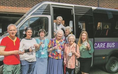 Volunteers and regular passengers on the bus prepare for this year's Great Jewish Bake Day
