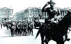 German soldiers march along the Arc de Triomphe
in June 1940 German soldiers march along the Arc de Triomphe
in June 1940