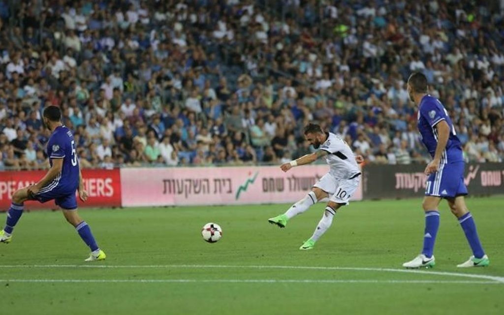 Sadiku fires in his - and Albania's - second goal of the evening.