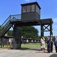 The Duchess of Cambridge with survivor Manfred Goldberg and the Duke of Cambridge with survivor Zigi Shipper during their visit to the former Nazi concentration camp at Stutthof, near Gdansk, on the second day of their three-day tour of Poland. 

Photo credit: Bruce Adams/Daily Mail/PA Wire