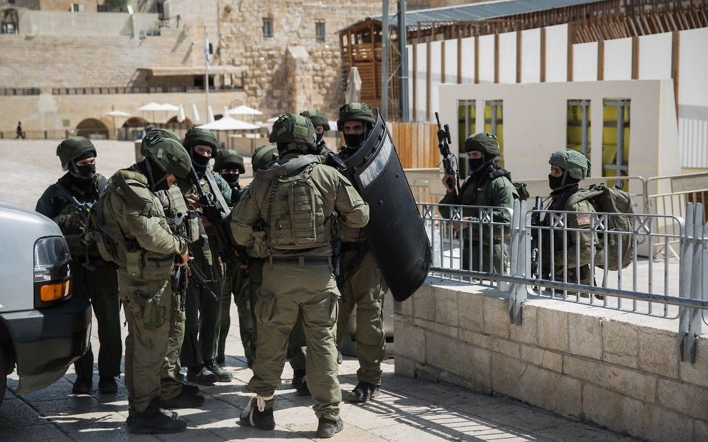 Israeli security near the scene where two Israeli solders were seriously injured and one wounded lightly  . Photo by: JINIPIX