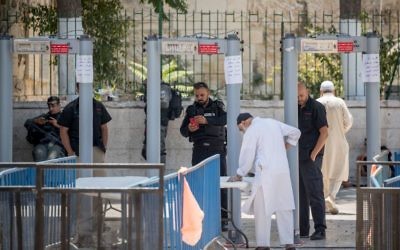Palestinians Muslim worshippers  over the age of 50 being allowed to enter the Al Aqsa compound through controversial metal detectors 
Photo by: JINIPIX