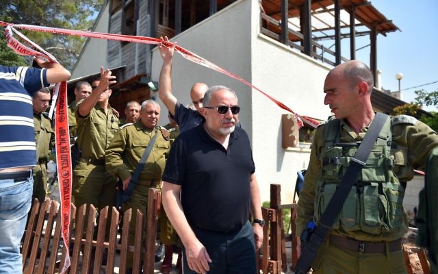Israeli minister of Defence Avigdor Liberman and IDF Chief of Staff Gadi Eisenkott the site of a terror attack in the settlement of Halamish, where three Israelis were murdered and one seriously injured by a Palestinian terrorist, in a stabbing attack. 

(Photo by Ariel Hermoni/Ministry of Defense via JINIPIX)