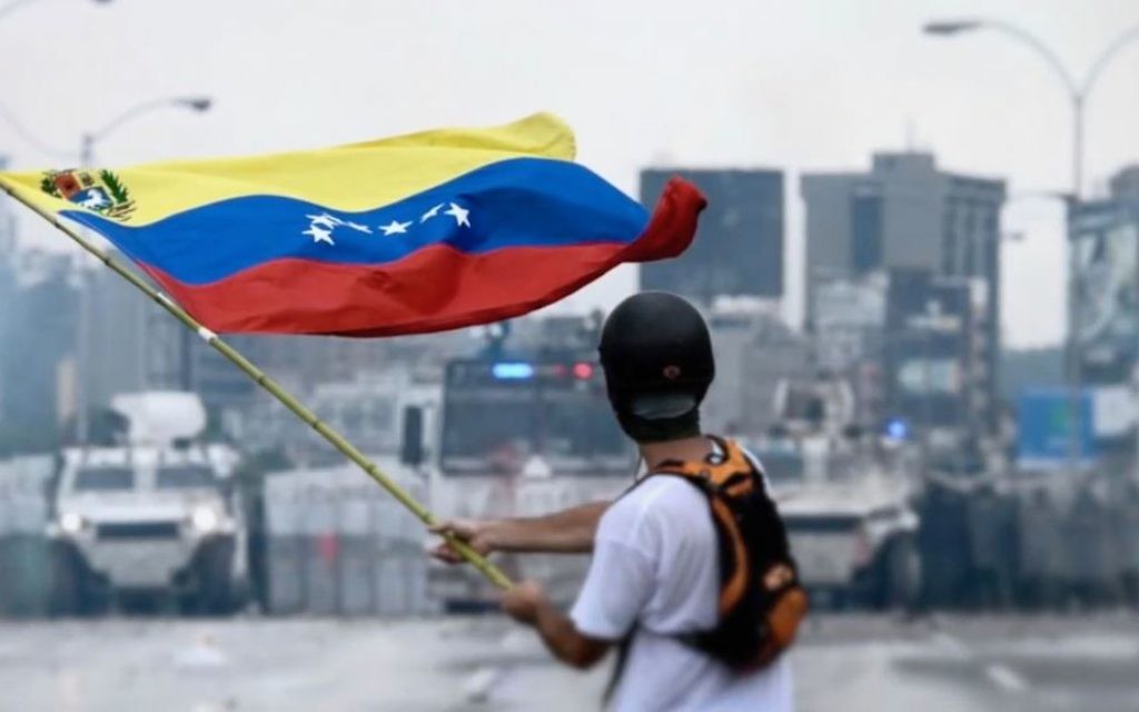 Protester facing the Venezuelan National Guard during a protest in May 2017.