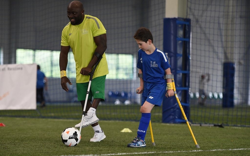 Rio with his coach Bamgbopa Abayomi Alabai (AKA Yomi). Picture: Photo Credit: Maciej Gillert/mediapictures.pl