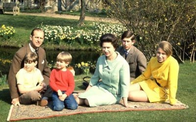 The Queen and her family pictured on a Persian rug at Windsor