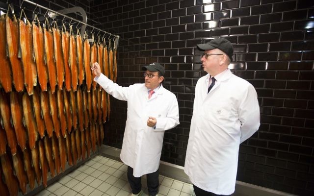 Lance Forman with Michael Gove, inspecting smoked salmon
