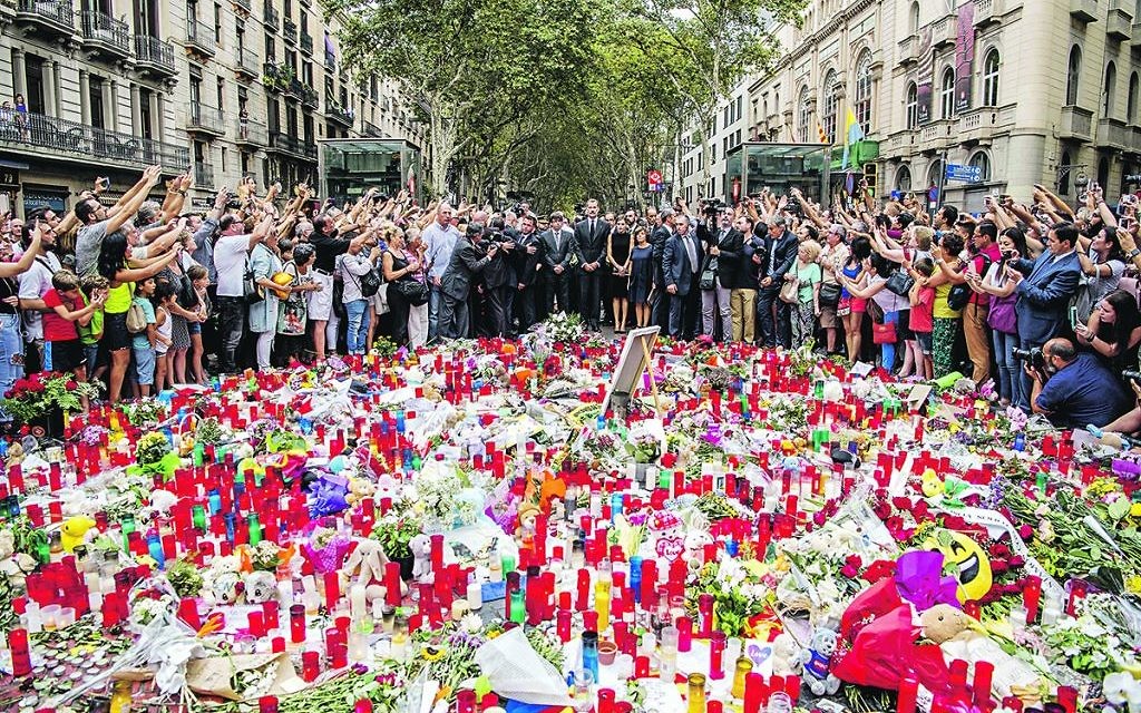 Mourners in Barcelona paying tribute to those murdered in the recent terrorist attack