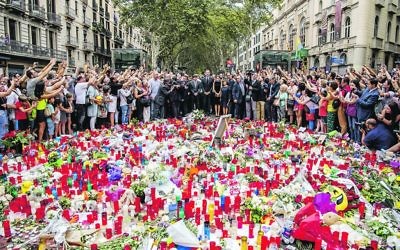 Mourners in Barcelona paying tribute to those murdered in the recent terrorist attack