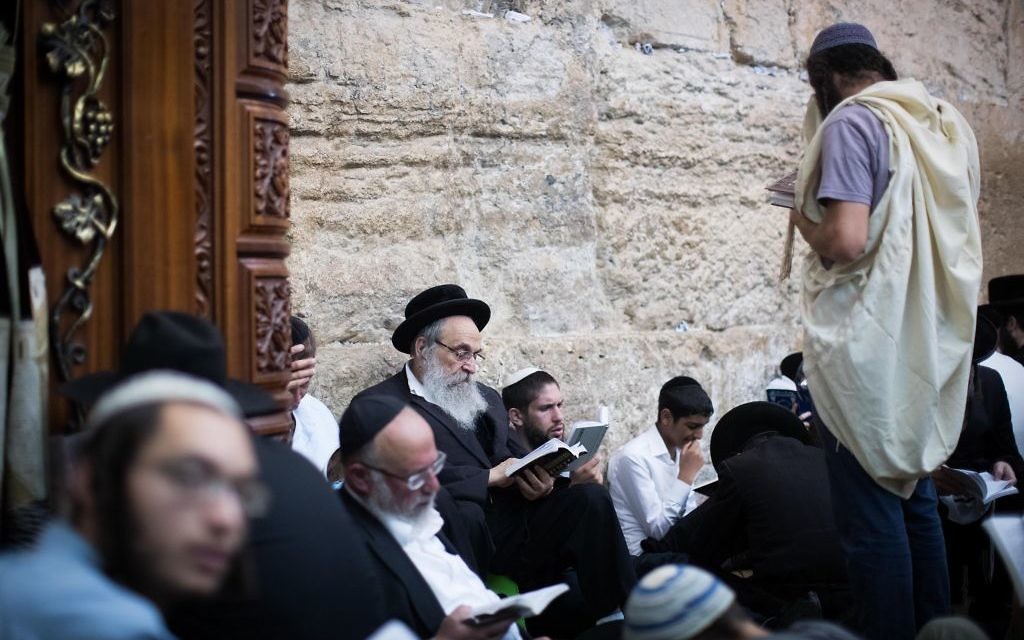 Charedi men pray at the Western Wall in the Old City of Jerusalem

Photo by: JINIPIX