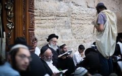 Charedi men pray at the Western Wall in the Old City of Jerusalem

Photo by: JINIPIX