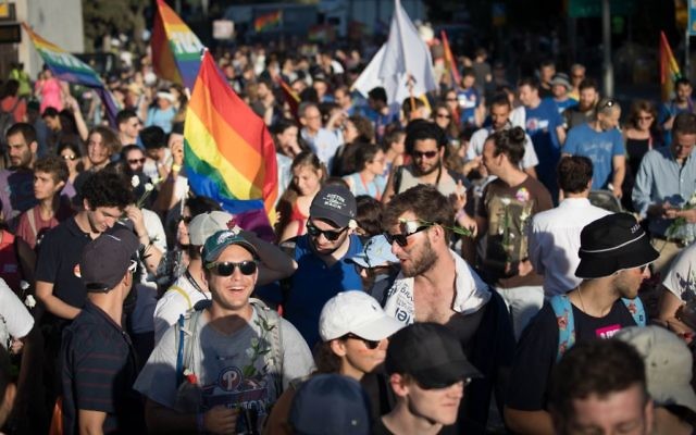 People participate in the annual Gay Pride parade in central Jerusalem, under heavy security on August 3, 2017. Photo by: JINIPIX