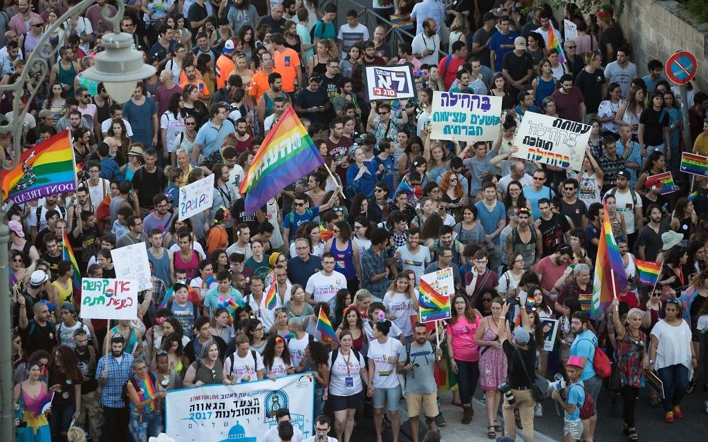 People participate in the annual Gay Pride parade in central Jerusalem, under heavy security on August 3, 2017. Photo by: JINIPIX