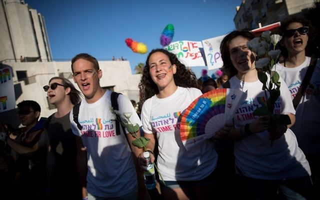 People participate in the annual Gay Pride parade in central Jerusalem, under heavy security on August 3, 2017. Photo by: JINIPIX