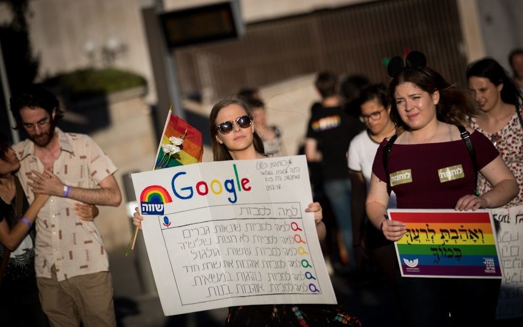 People participate in the annual Gay Pride parade in central Jerusalem, under heavy security on August 3, 2017. Photo by: JINIPIX