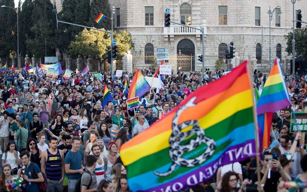 People participate in the annual Gay Pride parade in central Jerusalem, under heavy security on August 3, 2017. Photo by: JINIPIX