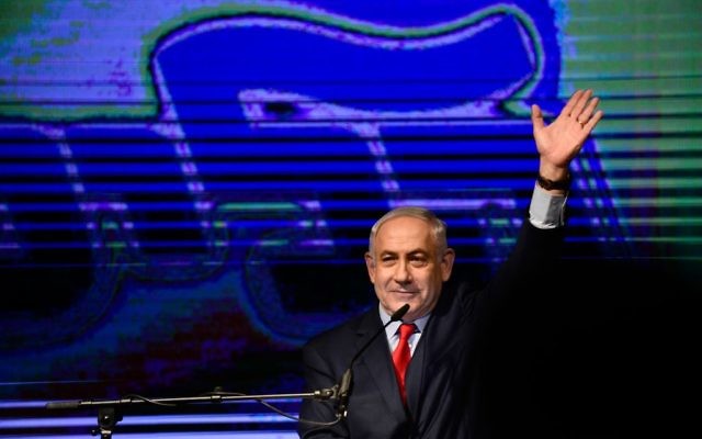 Prime Minister Benjamin Netanyahu with his wife Sara and Likud party members at a rally in his support, as he and his wife face legal investigations, in Tel Aviv

Photo by Tomer Neuberg- JINIPIX