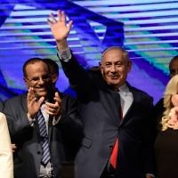 Prime Minister Benjamin Netanyahu with his wife Sara and Likud party members at a rally (August 2017)

Photo by Tomer Neuberg- JINIPIX