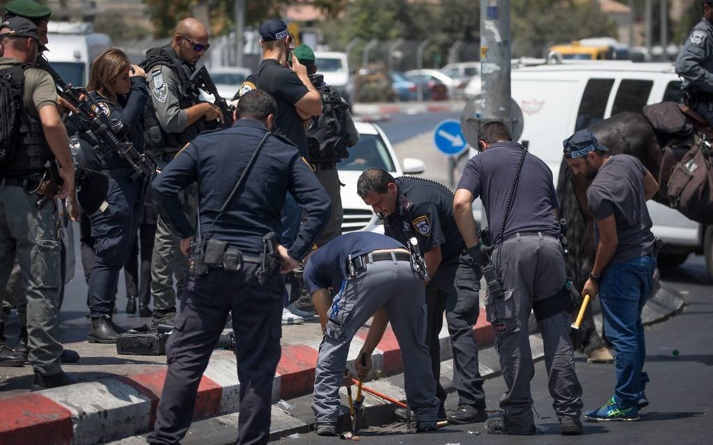 Israeli security forces at the scene of a stabbing attack near Damascus Gate outside Jerusalem Old City.

Photo by: JINIPIX
