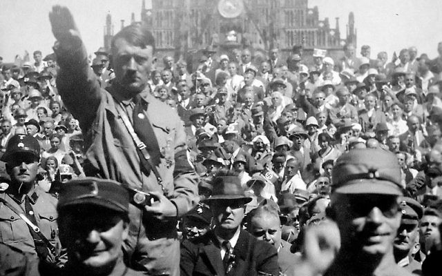 Hitler and Hermann Göring saluting at a 1928 Nazi Party rally in Nuremberg