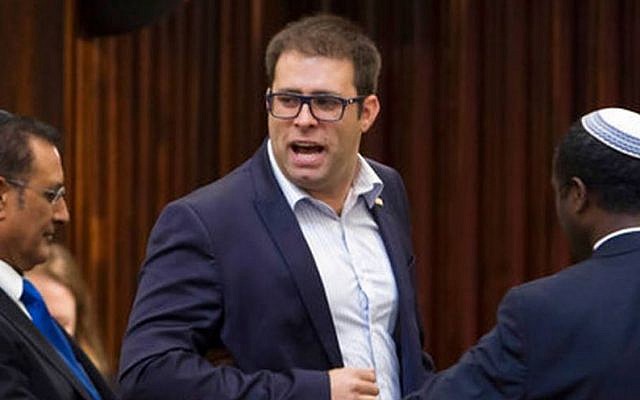 Oren Hazan is escorted from the Knesset after one of his outbursts