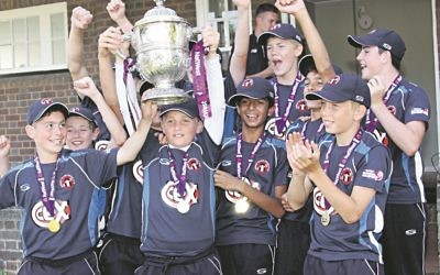 Captain Oliver White lifts the cup, Ben is pictured second row, second from left