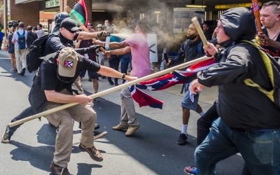 Far-right protestors and anti-fascist demonstrators clash in Charlottesville, Virginia, in August.