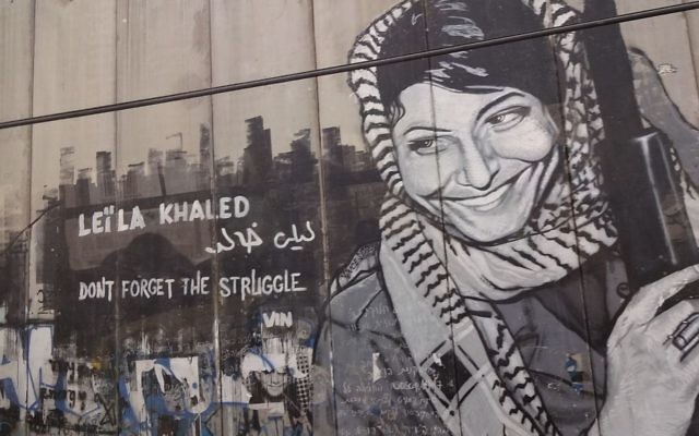Leila Khaled graffiti on the Israeli West Bank barrier near Bethlehem.