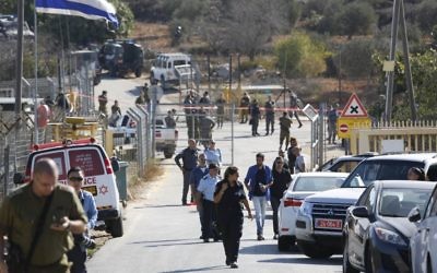 Israeli security deploys at an entrance to Har Adar settlement near Jerusalem, after a Palestinian assailant opened fire killing three Israeli men and critically wounding a fourth.

 (AP Photo/Mahmoud Illean)