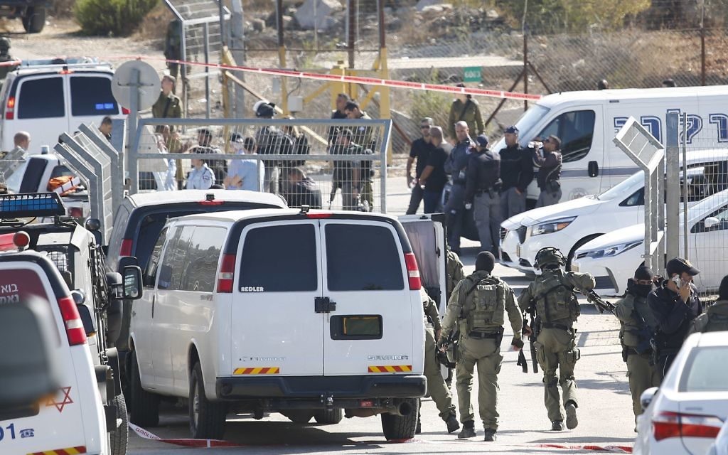 Israeli security deploys at an entrance to Har Adar settlement near Jerusalem, after a Palestinian assailant opened fire killing three Israeli men and critically wounding a fourth.

 (AP Photo/Mahmoud Illean)