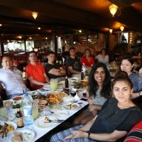 Let's Talk Business group at a restaurant in the West Bank