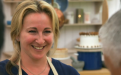 Stacey Hart smiling after receiving positive feedback on her bakewell