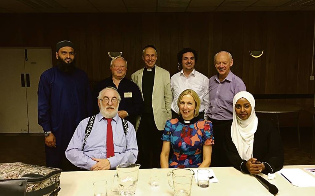 Imam Shakeel Begg is first on the left at the back, pictured at Catford and Bromley with other faith leaders