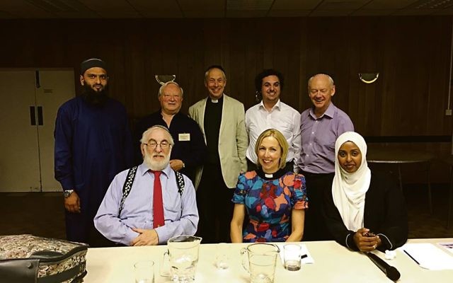 Imam Shakeel Begg is first on the left at the back, pictured at Catford and Bromley with other faith leaders