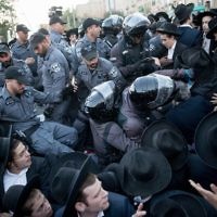 Ultra Orthodox Jewish men are being arrested by Israeli police as they block a road during a protest in Jerusalem, Israel, 19 October 2017.  

 Photo by: JINIPIX